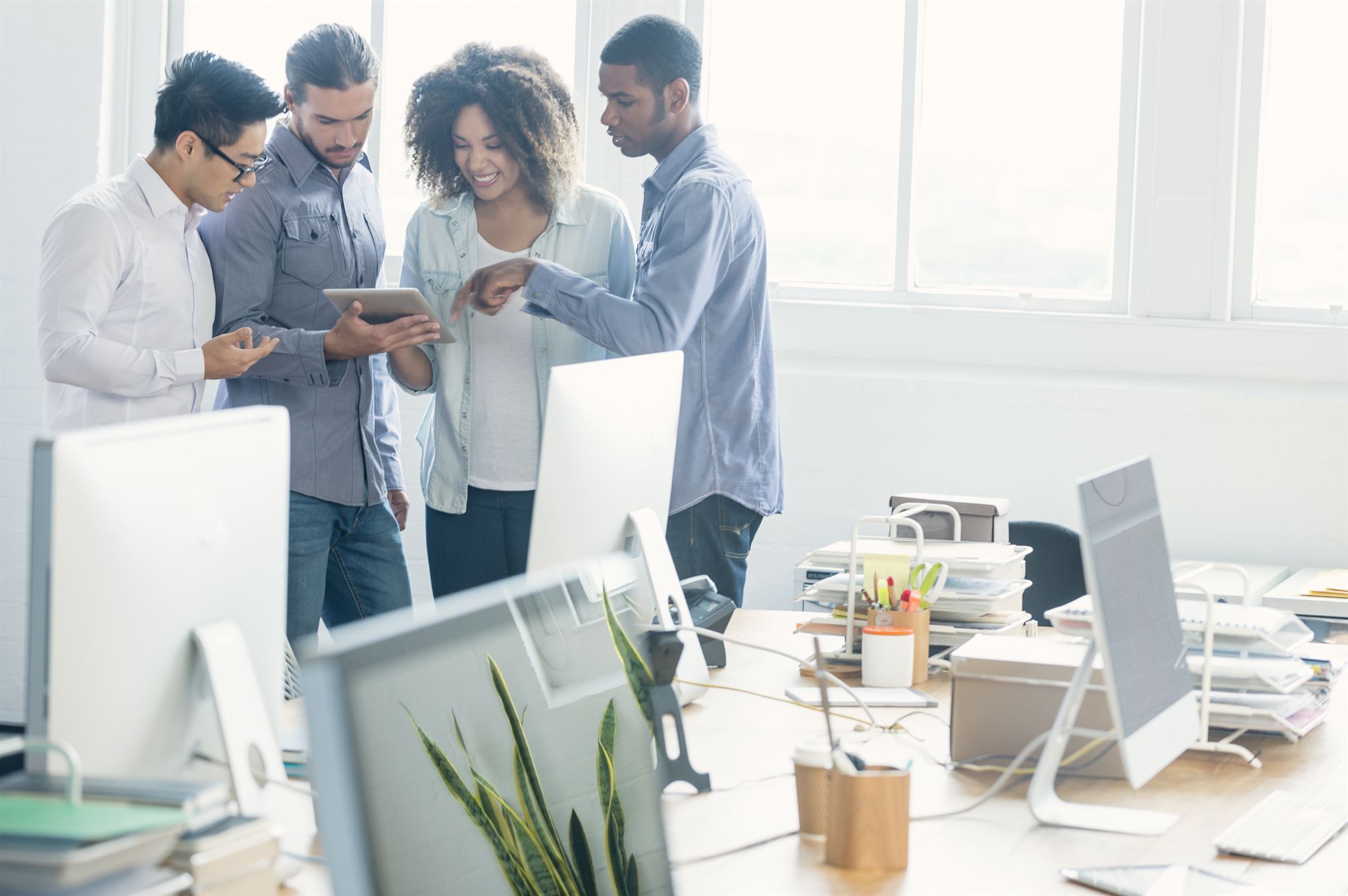 Funcionários felizes no trabalho